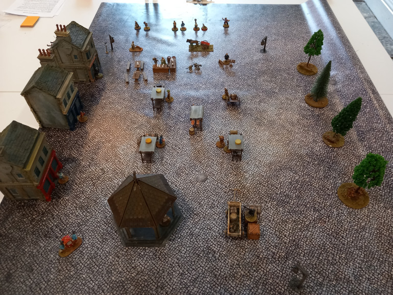 The board lay out. 4 cheese stalls with butcher in the middle. Other areas are the malt cross which Dragoons can't enter. The Lincoln merchants wagon. The gin stand and stocks. One team ended up in the stocks early in the game and failed to get a card go escape. We thought maybe those captured have to spend a number of turns locked up instead 