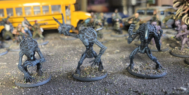 Easy to paint, undercoated black, mouths painted white, with shading to pale turquoise on outer edges. Tidied up edges then dry brushed using Warpaints The Darkness ( a very dark blue) adding a small amount of white on progressive drybrushes until I was happy. About half an hour for all three miniatures.