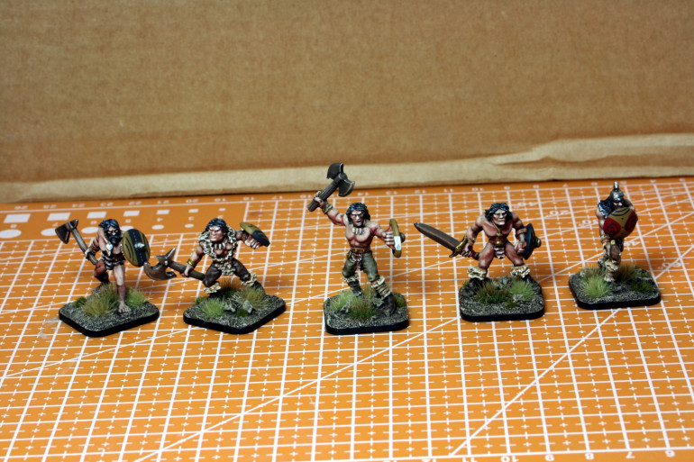 Added an oil wash, painted up some details and added tufts - battle ready