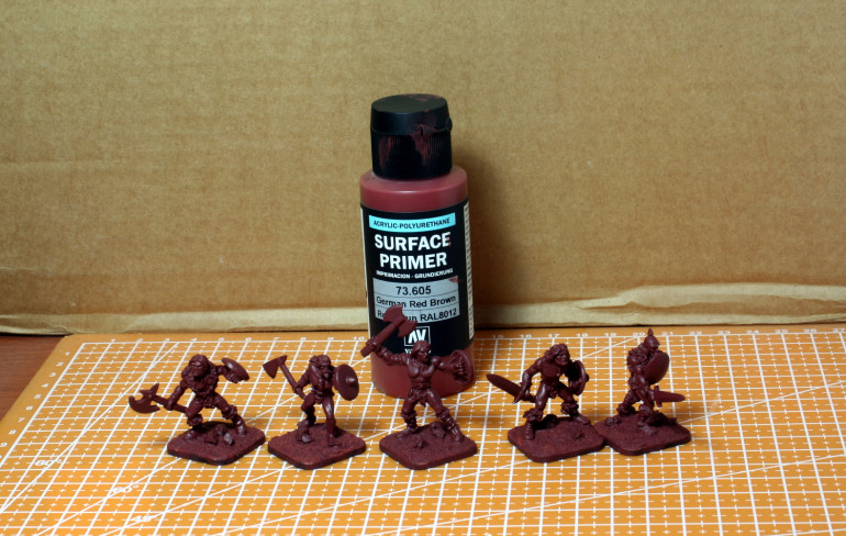 I decided to prime with a brick red due to all the exposed skin.