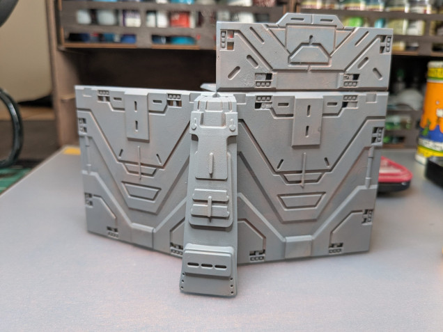 I forgot to take a picture of the bottles here, but I applied chipping medium through the airbush then applied the basecoat of Medium Gunship Grey. I wasn't worried about 100% coverage because I want this is to look weathered and beat up at the end.