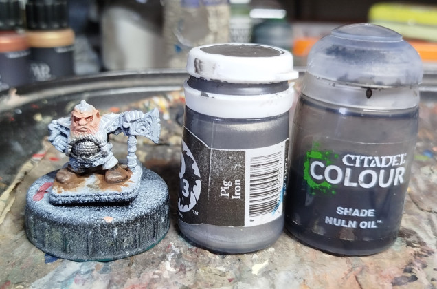 What I tried to do: Undercoat Black and then drybrush P3 Pig Iron and call it done.  What I did: Drybrush too heavy and lose all the black.  Apply a wash of GW Nuln Oil, then use the edge of a brush to highlight with P3 Pig Iron.