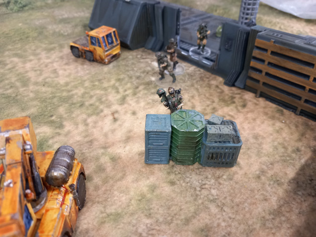 Lt Armstrong calls for puck up as Sgt Brammers team head with the pass key to the extraction point. At this point more spotters arrive. Despite being bad shots the xenos close in to melee range and the sniper is overwhelmed. Luckily the dropship gives covering fire when it arrives giving the survivors time to escape. The mission is a success and with the passkey secured the op centre can be breached.