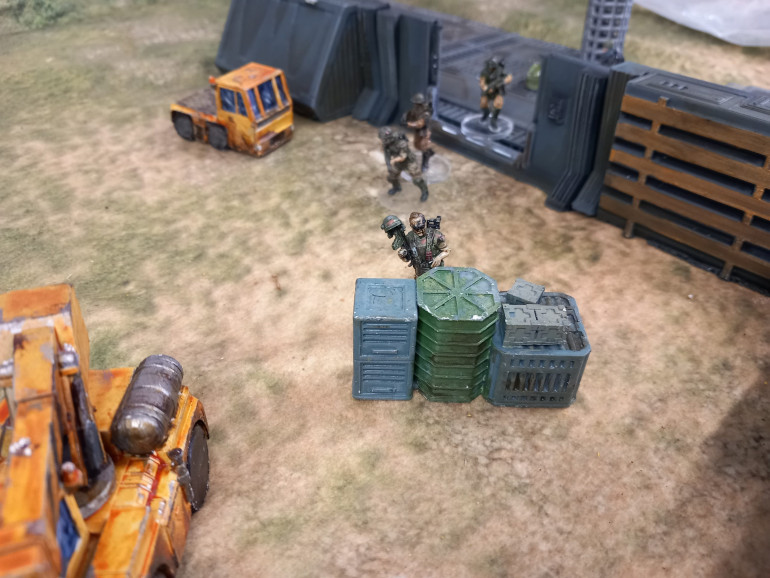 Lt Armstrong calls for puck up as Sgt Brammers team head with the pass key to the extraction point. At this point more spotters arrive. Despite being bad shots the xenos close in to melee range and the sniper is overwhelmed. Luckily the dropship gives covering fire when it arrives giving the survivors time to escape. The mission is a success and with the passkey secured the op centre can be breached.