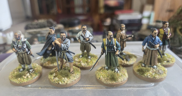 I had fully painted all the basic colours on these, but I progressed no further as I was intimidated by decorations on the fabric. But looking at these models I was happy with the basic paint scheme completed over a year ago, so I decided to just finish the basing and call them done. I may return at a later date to add decorations to cloth.