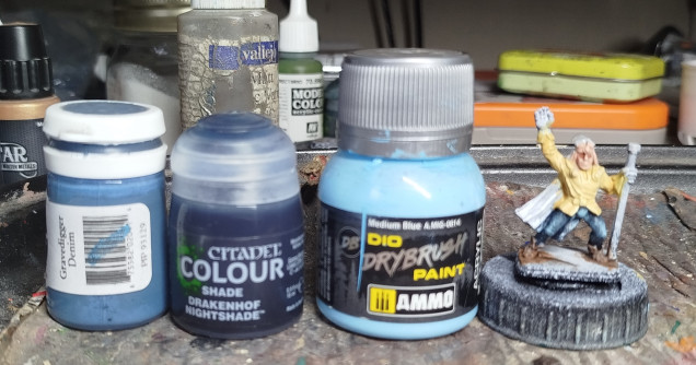 Base with P3 Gravedigger Denim, wash with GW Drakenhof Nightshade, then drybrush with A.Mig-0614 Medium Blue.  Then, if you're like me, redo the wash and drybrush because you put the first drybrush on too heavy.  Still think its a bit much, but accept it rather than rish making things progressively worse, layer after layer.