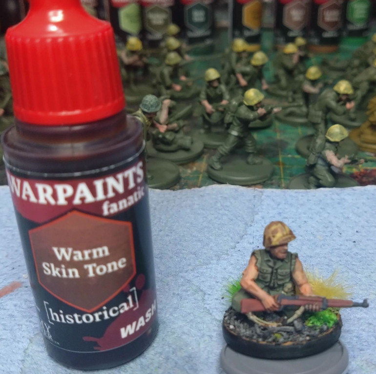 For the skin I washed it with this, but used a blend of reikland flesh shade , agrax and some medium, as seen on sonic sledgehammer 