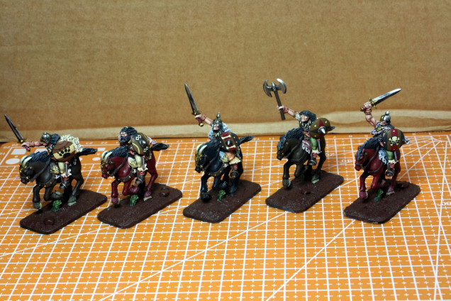 I added decals and highlights. The deep shadows come in the following stage.