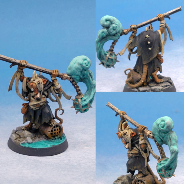 The bandages were a bone colour. Ushabti Bone, with a wash of Voodoo Shade and highlight of Ivory White.