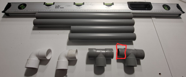 The one indicated has one opening that doesn't fit the 32mm tube!