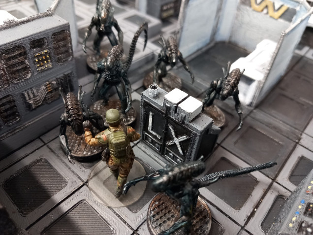 Despite some well placed grenades Armstrong us overwhelmed. Unable to spot the blips in the dense corridors the marines struggle to spot the aliens until it's too late and they continue to swarm on to their location 
