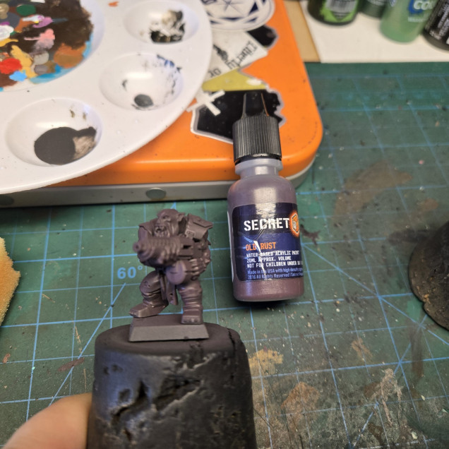 I start with a base coat of old rust, this is a purplish brown red color. 