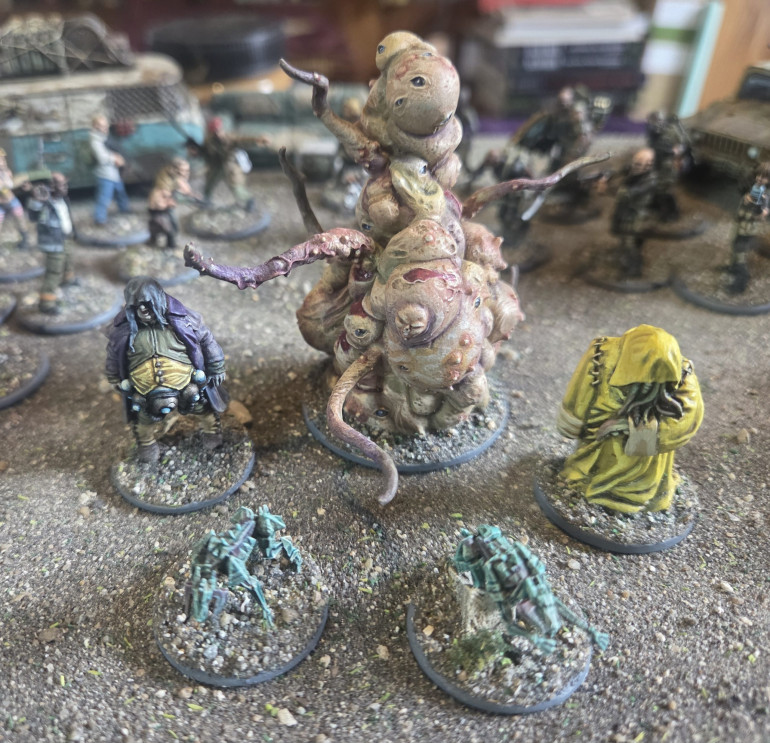 A selection of monster/encounter models that I had finished for other projects. Two Hounds of Tindaloos from Modiphious, Psychic Overlord from Hasslefree with sculpted hood,  Tentacled Cultist (sadly from a company that obly seemed to be around for a few months, they produced a lovely range of modern horror miniatures the company was called Something Wicked)