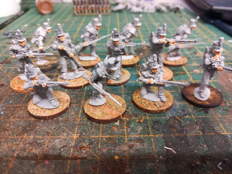 Two packs of metal perry miniatures British light infantry. This makes a 12 man unit. I picked these up at partizan last week