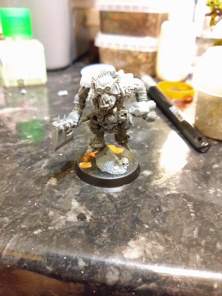 The build was simple enough but I have never painted 40K orcs before and never considered painting orcs with no green paint allowed.