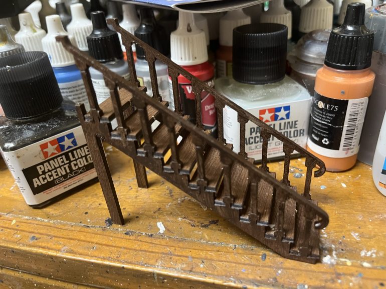 Once the stairs were glued into place on one side, I press fit the other side into place and then glued the stairs to the other riser.