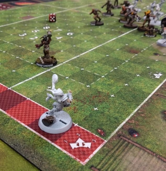 But after some amazing dodge rolls a catcher got free of my defensive line. Even with the best of efforts to disrupt a passing lane the elves threw a pass and they skipped into the end zone to make it 1 - nil.