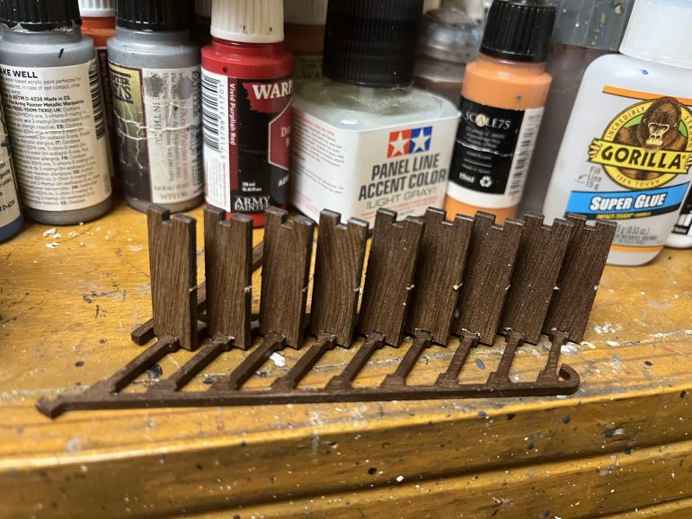 I glued the stair steps into the risers on one side.