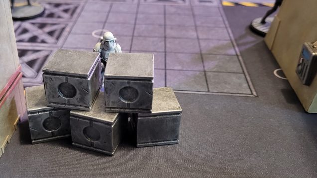 My opponent's Snowtroopers, on the other hand, were very good at using cover. They managed to creep through what should have been a kill corridor, eventually taking control of the left side of the board.