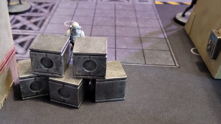 My opponent's Snowtroopers, on the other hand, were very good at using cover. They managed to creep through what should have been a kill corridor, eventually taking control of the left side of the board.