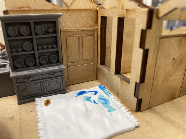 that leads into the open plan kitchen living room. very modern.