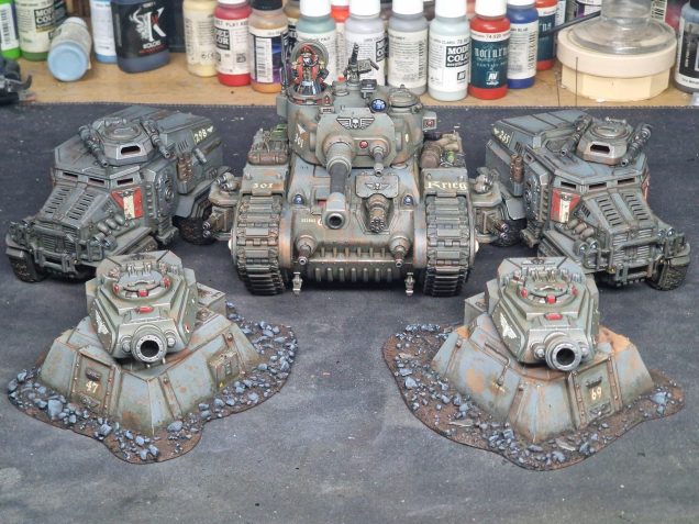 Finished tanks  middle being fully magnetised I also designed and printed some holders for spare Leman Russ turrets to use them as emplacements I still have the 2 full other tanks to paint.