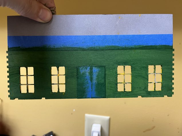 Upper floor interior. The area that’s above the masking tape is the back of the sign and will be painted as natural wood. 