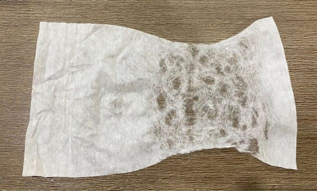I teased the baby wipe apart by pulling on it gently.  The more holes you create when doing this the less 'veins' will be created with the finished effect.