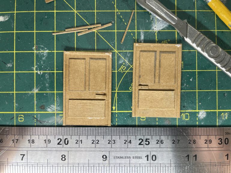 I made two doors by cutting out very basic shapes. I made them opposite however because they will be the same door