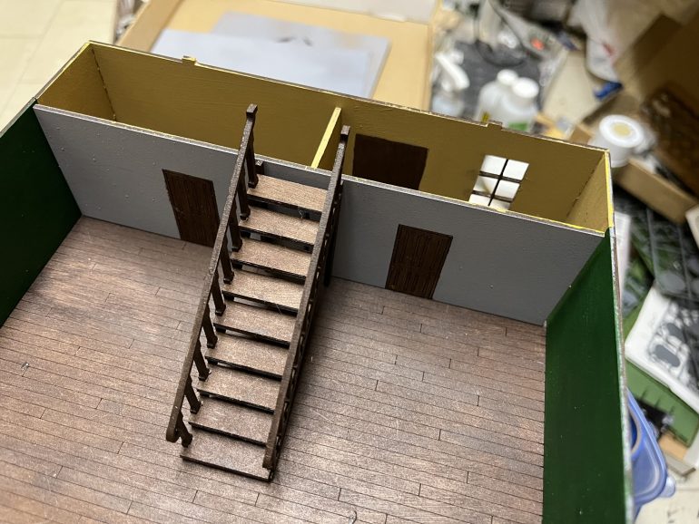 Interior of first floor. The back wall still needs to be painted. The stairs are in their approximate final position.