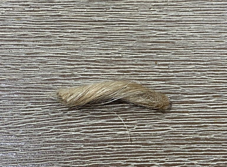 I then used a liquid superglue to glue one end of the string together.  It needs to be the thin stuff, not the gel.  I also used an activator to set the glue because I am impatient.