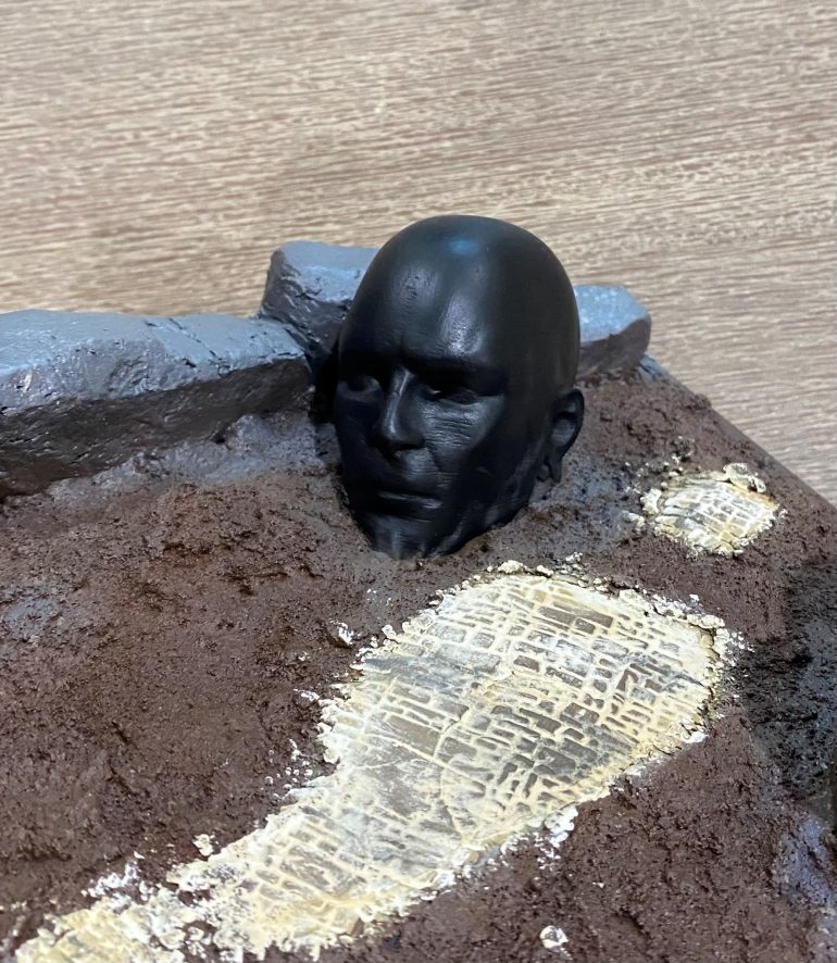 I started off by painting the statue with contrast black paint from Games Workshops range, although any black would have done the trick.