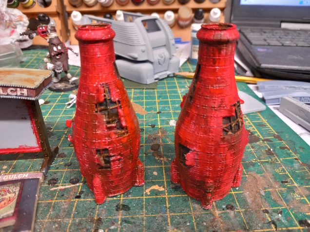 The giant bottles are from the cola cars set but every zone in the park I think needs some cola bottles visible 