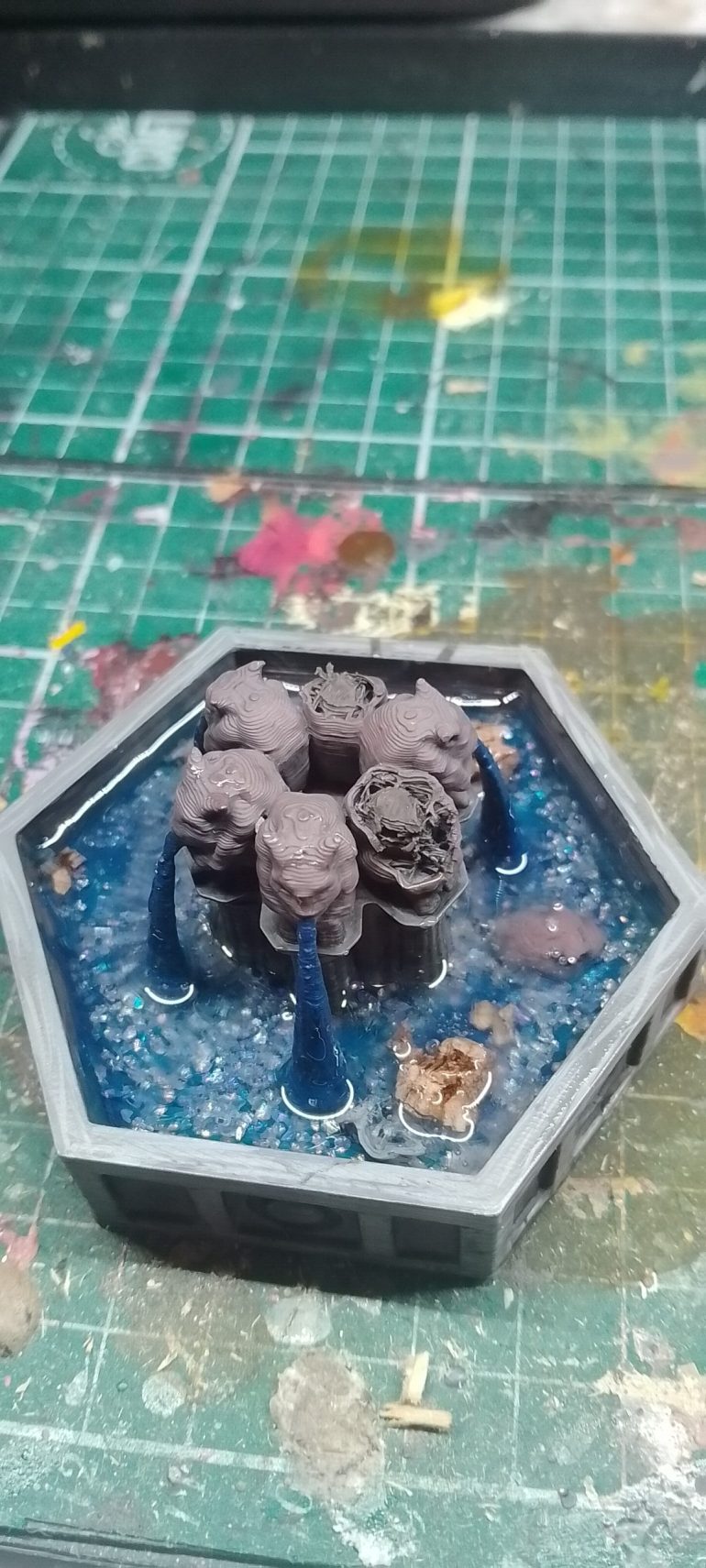 The fountain was then painted all over, ready for the treatment and chunks taken off the top