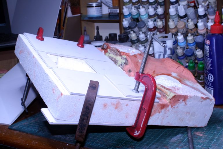 Added mounting board to raise the city.