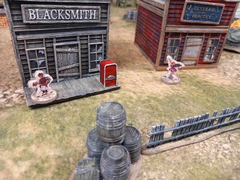 The original card terrain from the nuka world box set work if its ment to be a card stand up