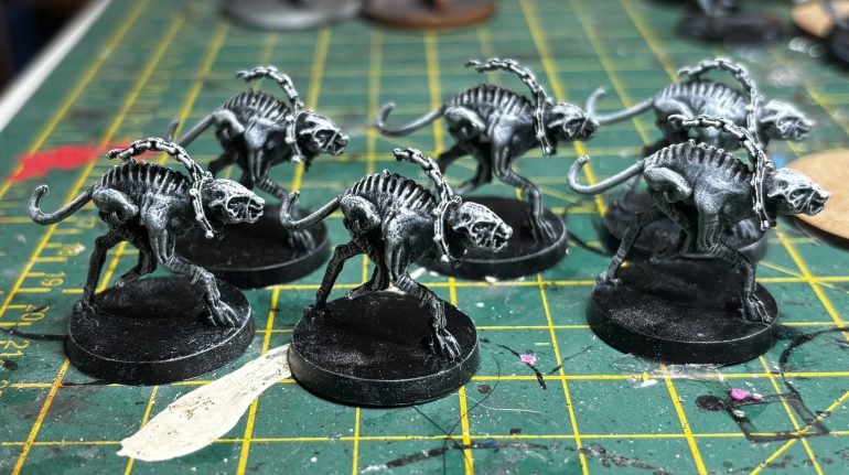 After adding a little model mates rust I found on the blades the Warriors are done. Now time for the Infernal Hounds