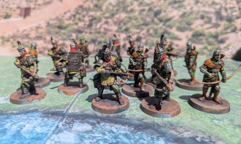 Archers and crossbow men about to realise they don't have to cross the river