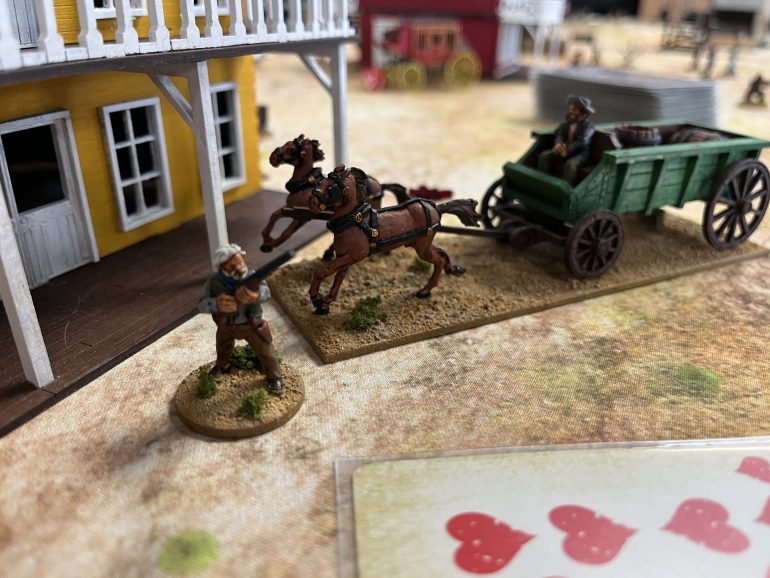 Boss Spearman herds the wagon team to the Lucky Strike.