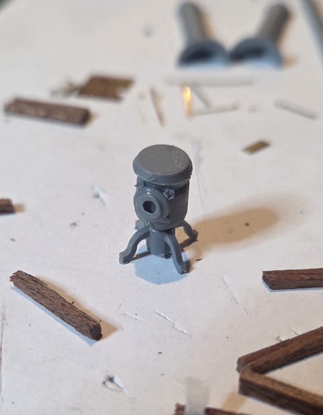 An attachment for the chimney made from a piece of scrap. It was at this point I realised the  burner was too small. So I ripped it apart and fortunately found a milk churn.