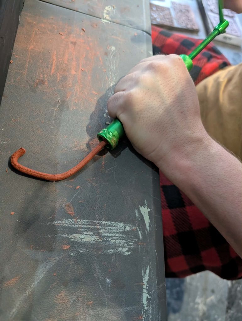 Load the extruder with as much clay as you can