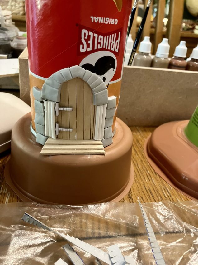 The main door made from coffee stirrers, FIMO and cotton buds