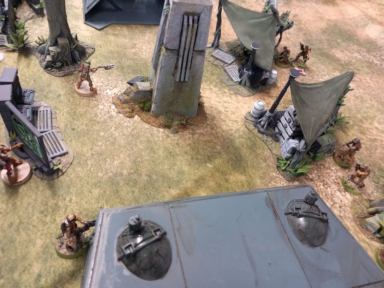 Boguns rattle gun lays down covering fire while krig leads the way himself towards the comms tower.