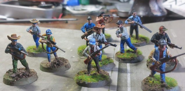 The jacket on figure on far right is probably the closest he has been to University education.