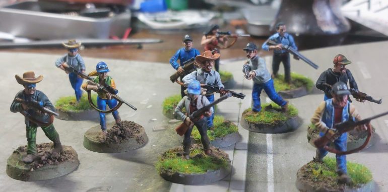 The jacket on figure on far right is probably the closest he has been to University education. 