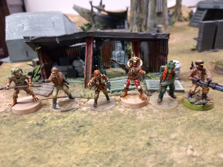 In a small mining camp they recruit an old clone wars veteran TRG76 although the aging clone goes by the name trigger. A down on her luck tech named Rosa also joins the crew hoping it will get her off this steamy moon. As ja goes looking for work Weedo goes looking for trouble. Getting drunk in a cantina Weedo has his blades stolen and wakes up with a hangover lost in the bush.