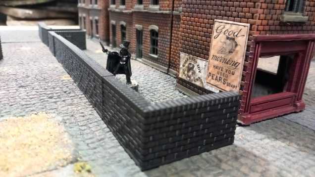 A friend of mine created some 3D files for walls and pavements which I printed to add to my table. The walls needed changing in s ale so the bricks matched my buildings. It's allowed me to add some back yards