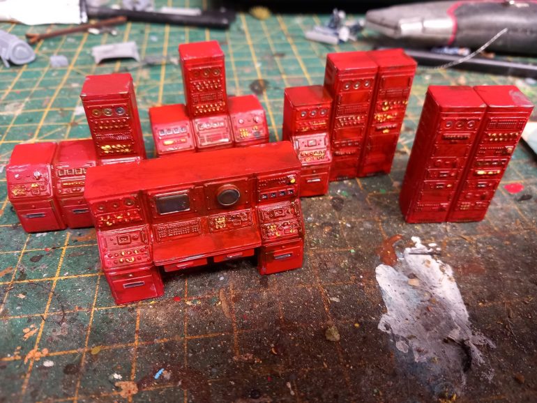 Some computer terminals painted nuka cola red 