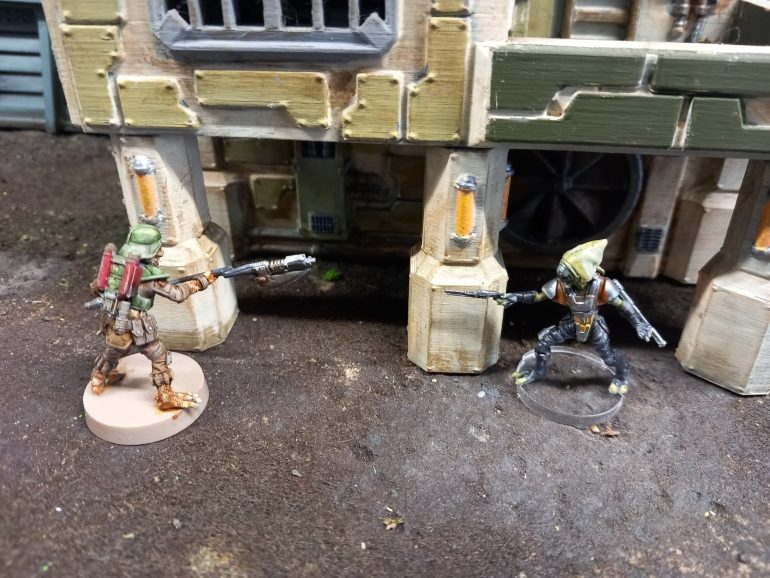 Sensing a kill Krig charges too close to the final scum who blasts krig off his feet. 