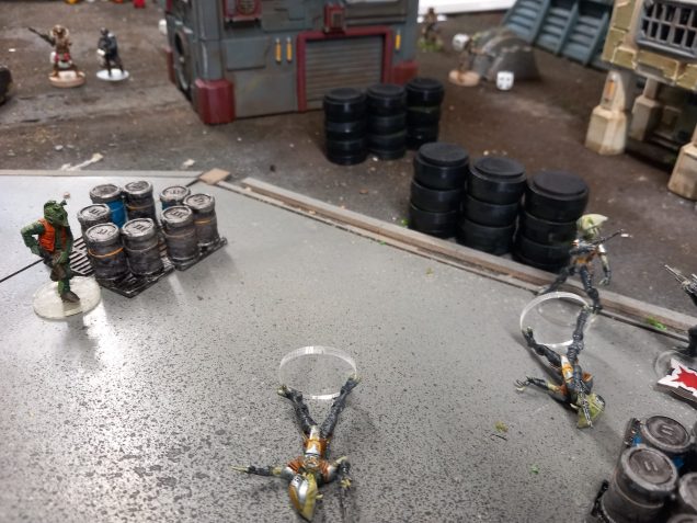 Weedos bold advance allows him to out flank the scum whose cover is no longer any use. With his close range hand gun he draws on the foe.